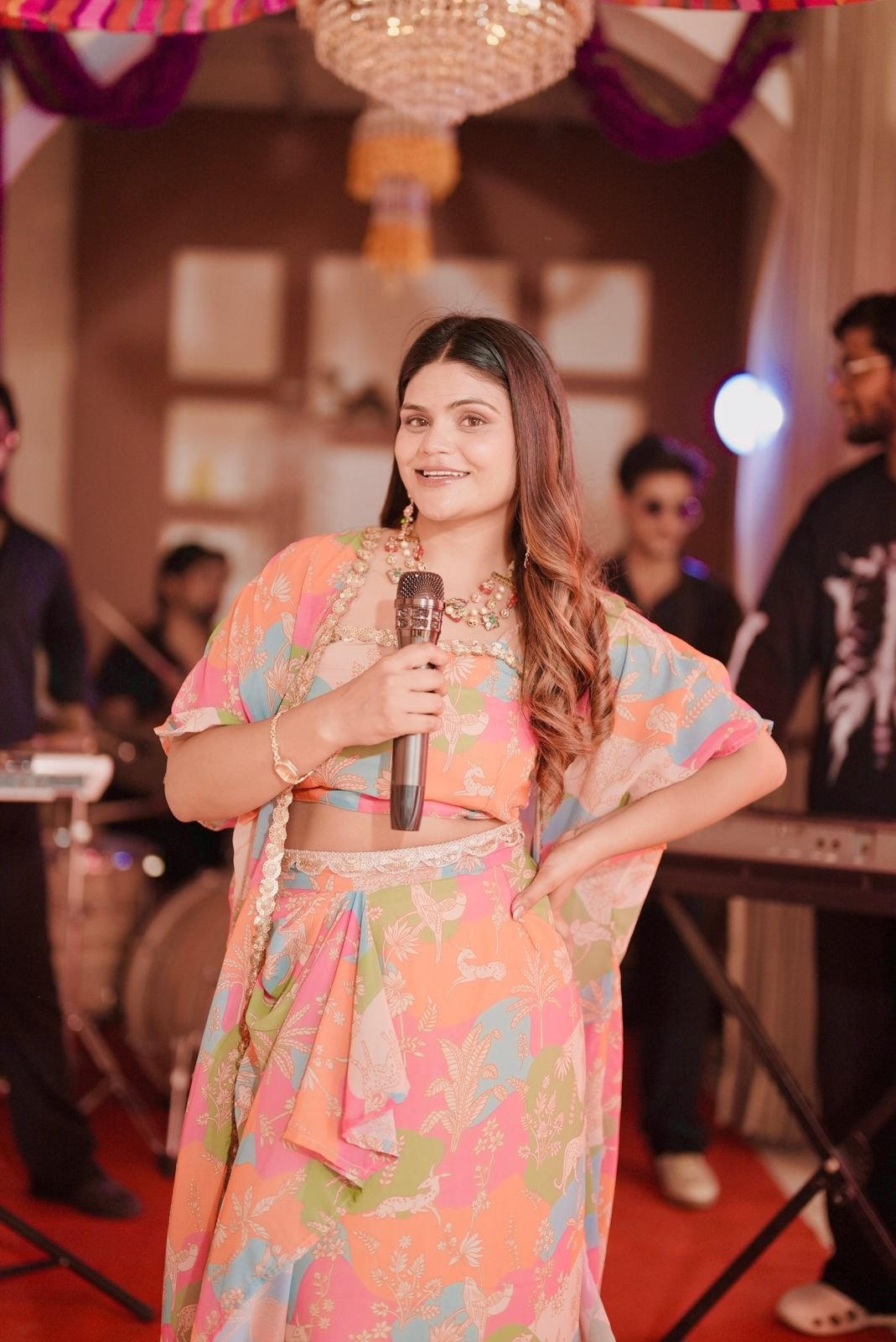 Anchal Bhatt engaging guests at a private event