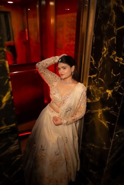 Editorial portrait in ivory and gold
